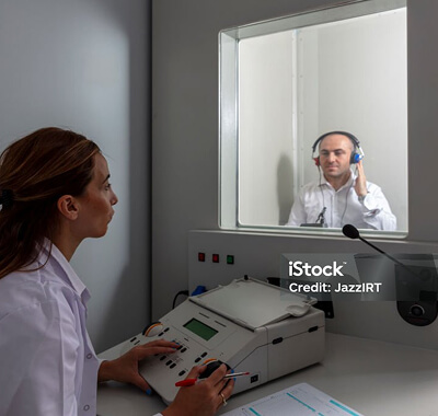 A man receiving audiometry testing