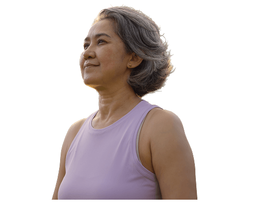 A woman in fitness attire, smiling away from camera