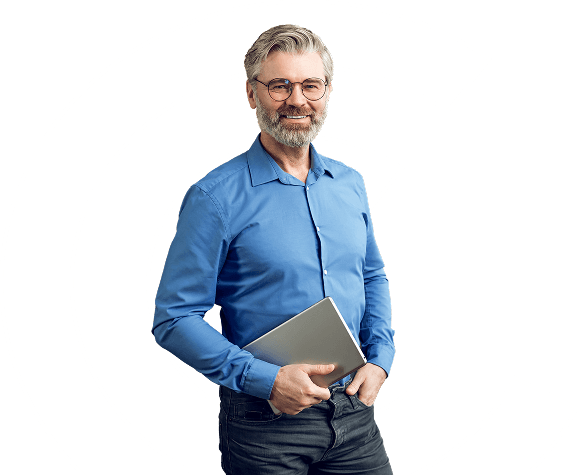 A man in a blue shirt, smiling to camera