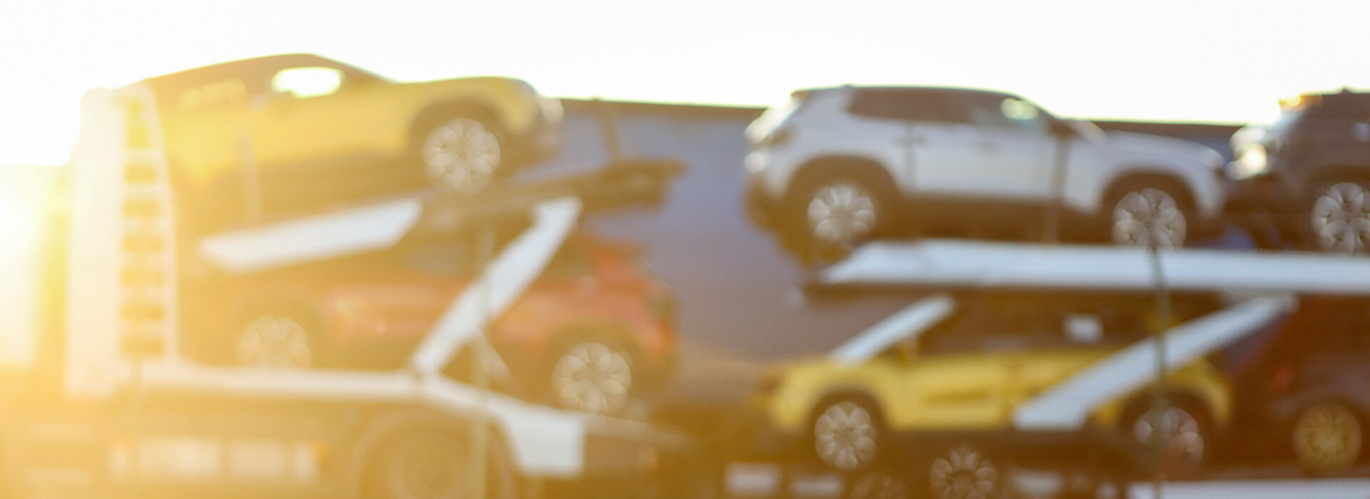 An out of focus photo of a car scrap yard